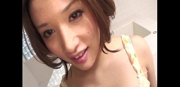  Sweet Emi Orihara in the bathroom on her knees sucking cock and playing with cum